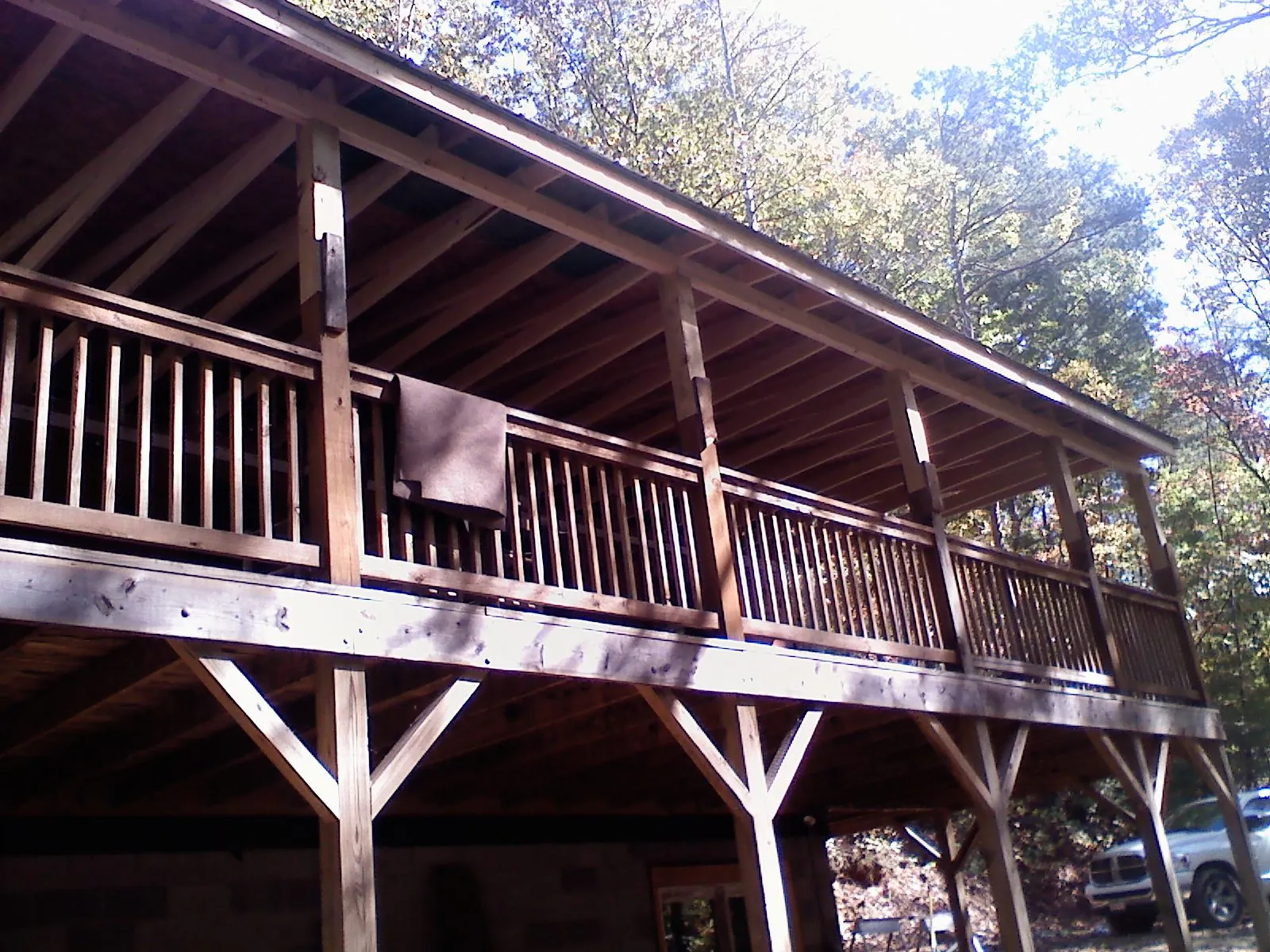 Timber framing under a new elevated porch and deck — Roof Leak Repair in Shenandoah Junction by Roofing Brothers